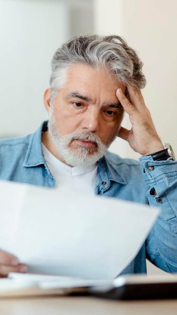 Man reading the water bill