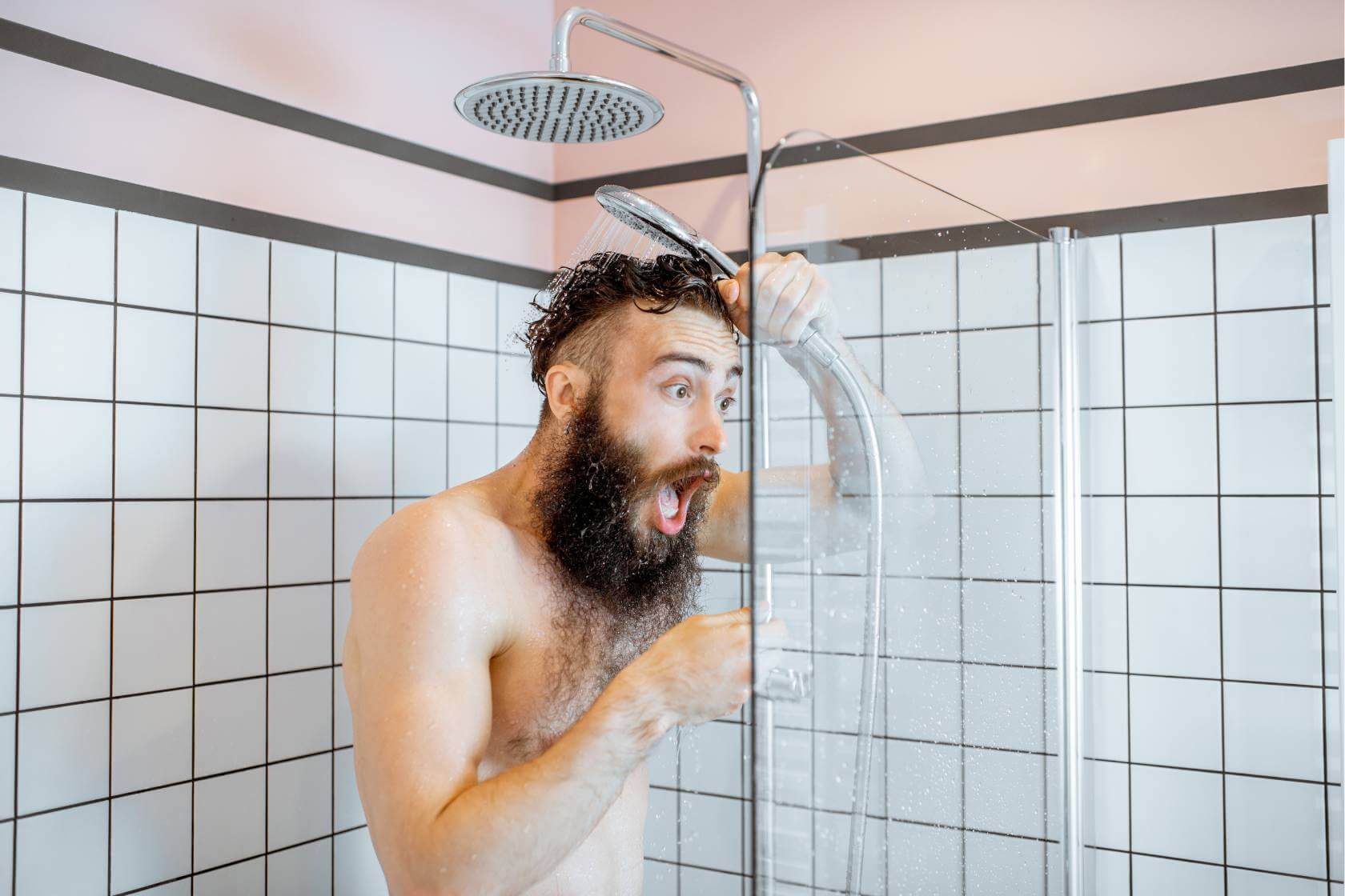A man in the shower with Low water pressure 